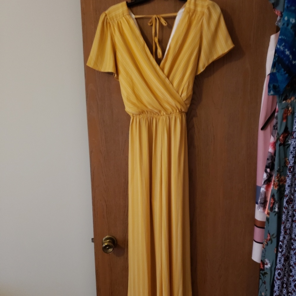 Yellow wrap style romper